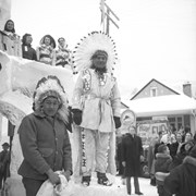 Cover image of Josiah or Joe Kaquitts (left) and Tom Kaquitts (Sûga Wakâ) (Dog God) (right) at ice palace, Banff Winter Carnival